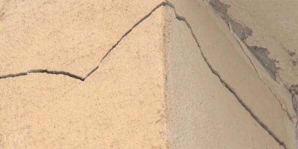 Түркістан қаласында салынған көпқабатты тұрғын үй қайта жөндеуді қажет етеді