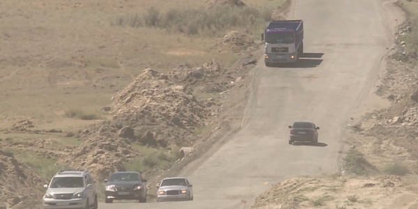 Талдықорған-Таскескен аралығындағы жолдың тең жартысына асфальт төселеді