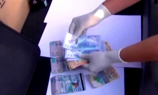 За взятку в полмиллиона тенге задержан начальник РОВД Алматинской области